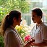 Florist speaking with a customer about floral options