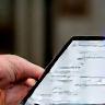 User filling in demo registration form on tablet